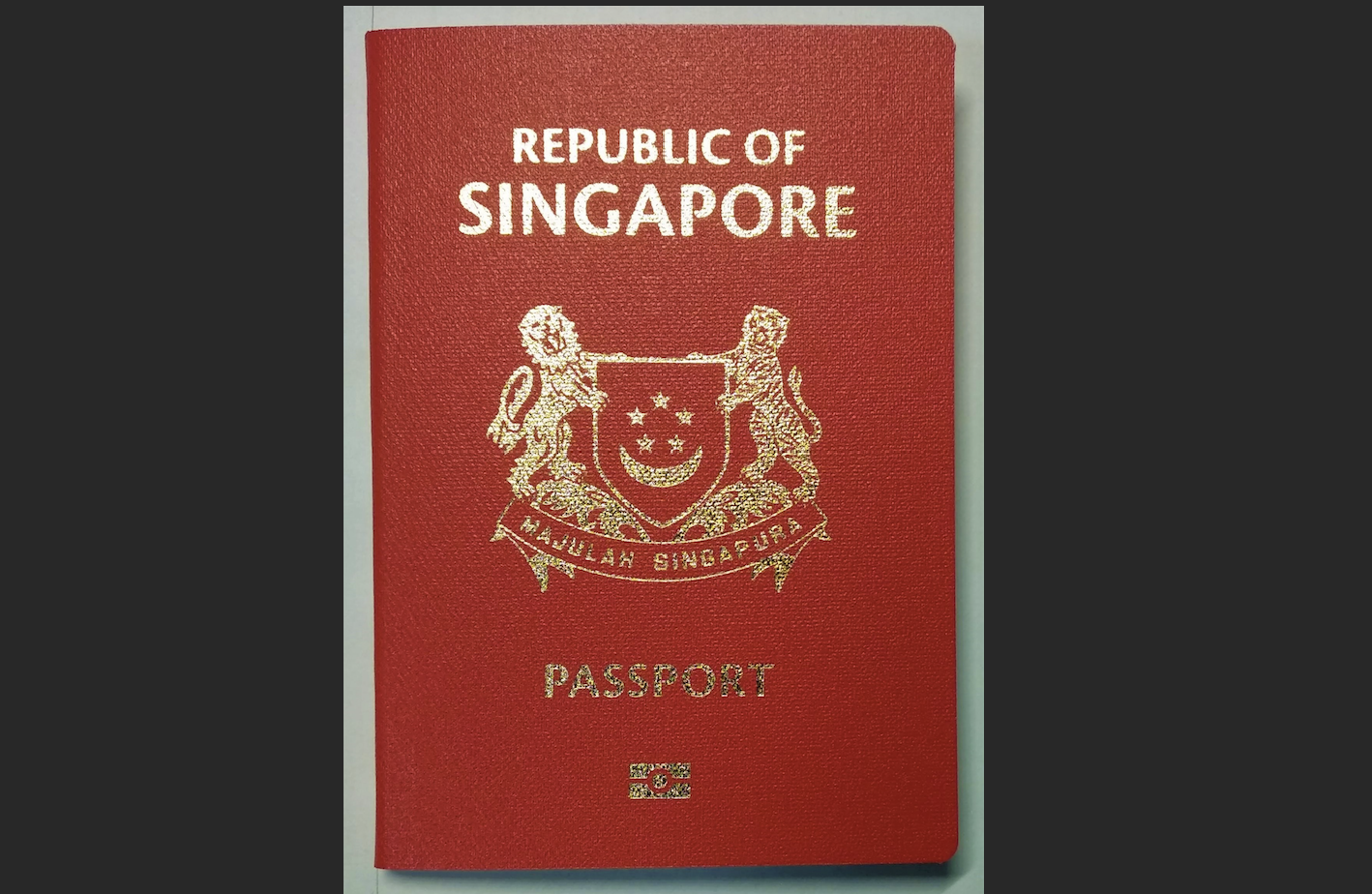 Online seller illegally hawking passport covers with Singapore national emblem