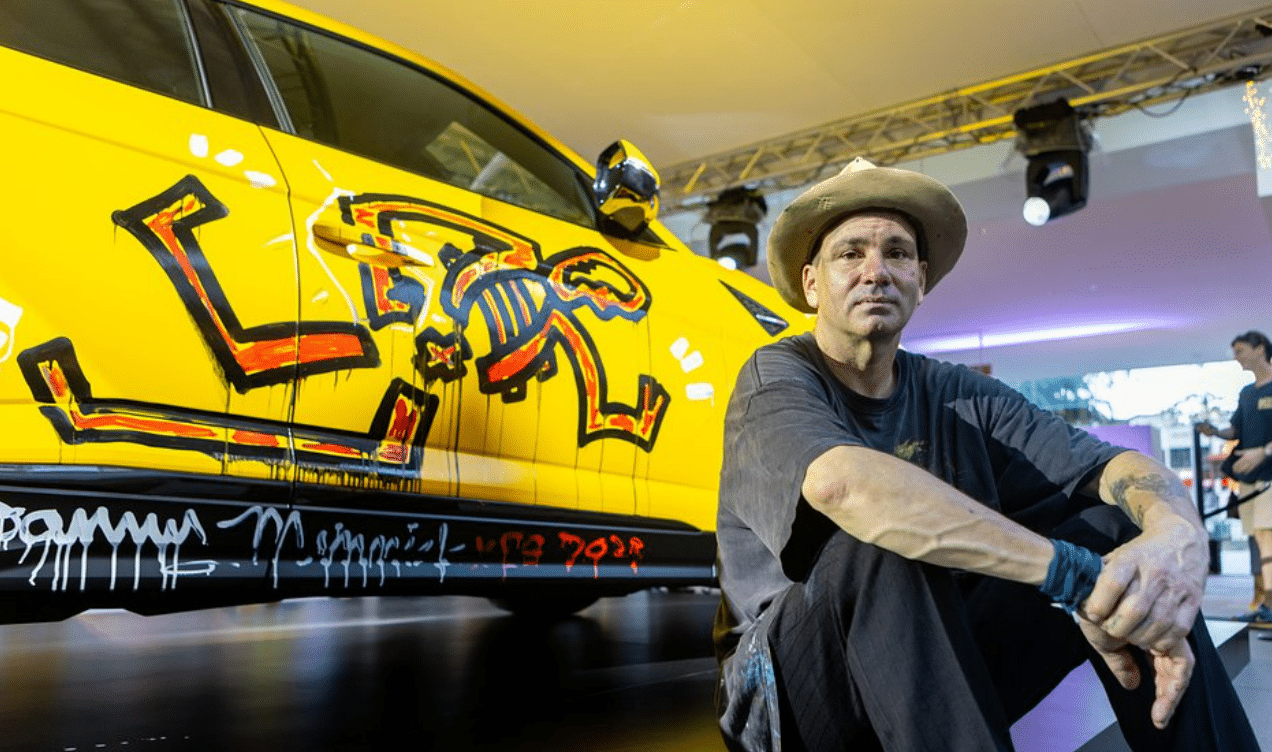 Artist Danny Minnick transforms Lamborghini into art canvas at One Holland Village Grand Opening