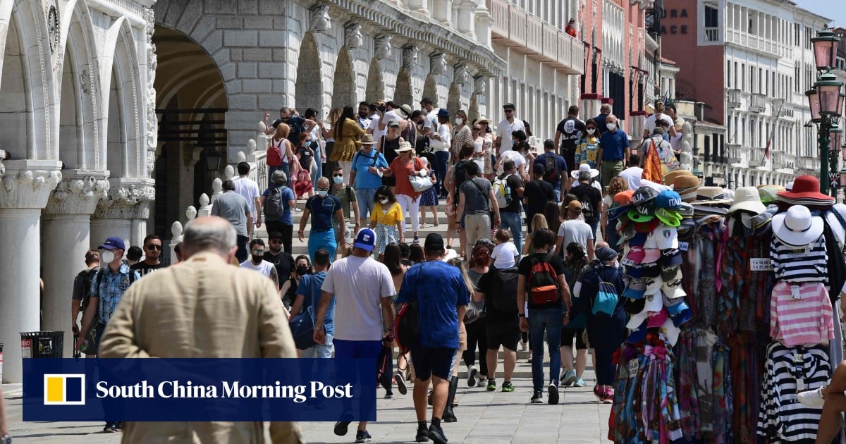 Venice starts selling entry tickets for peak periods to day trippers as the overwhelmed Italian city works to reduce visitor numbers