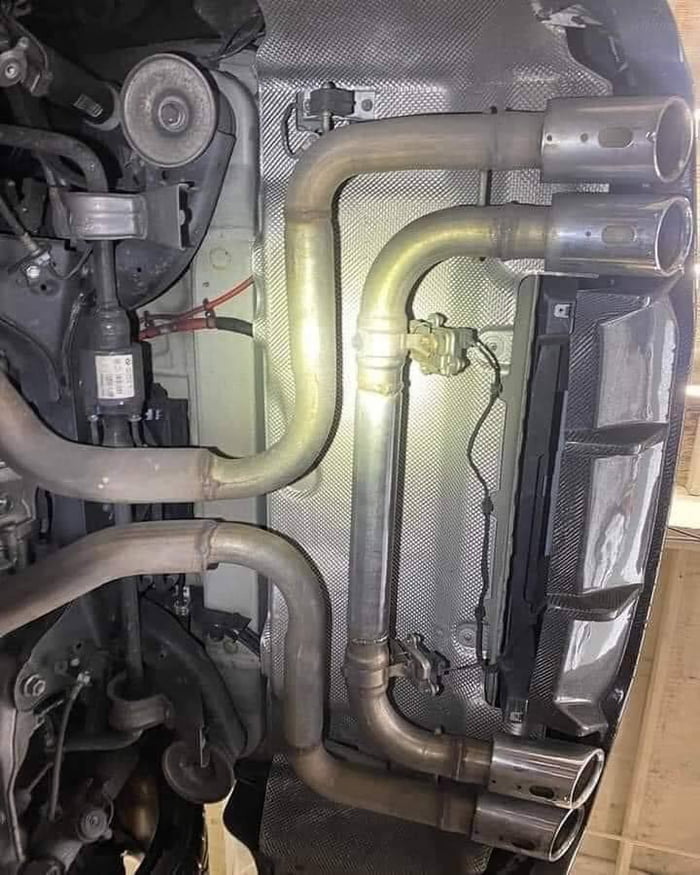 BMW owner complains that another shop installed a custom exhaust but the car is down on power.