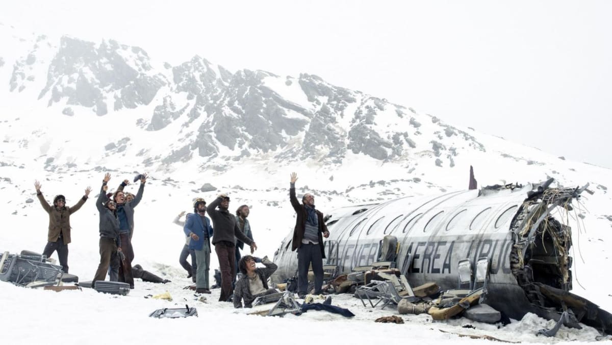 The 1972 Andes plane crash story has been told many times. Society Of The Snow is something new