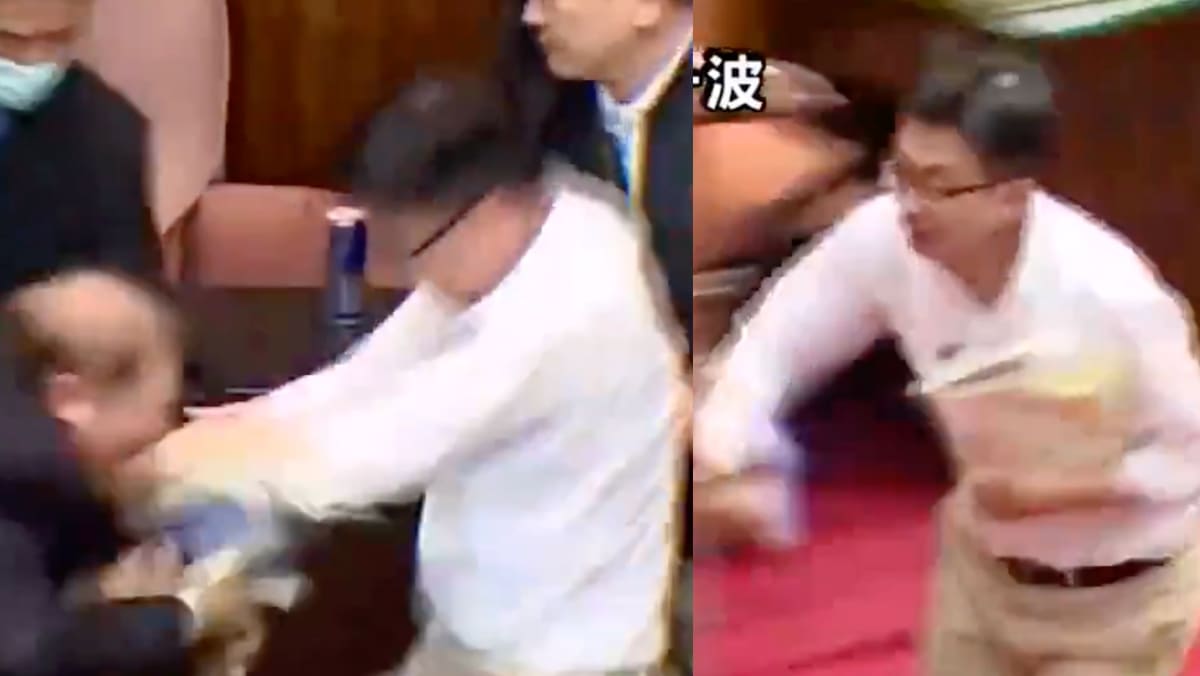 Taiwanese Politician Runs Away With Bill To Stop It From Being Passed During Parliament