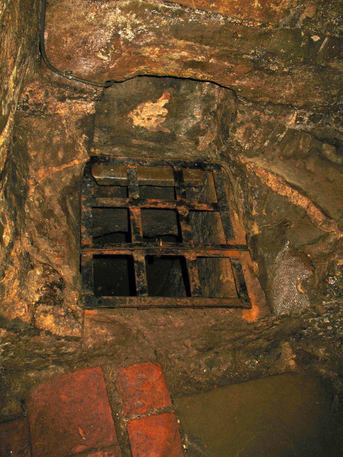 The lower dungeon of Warwick Castle. It\u2019s an \u2018oubliette\u2019, where prisoners were dropped and forgotten about