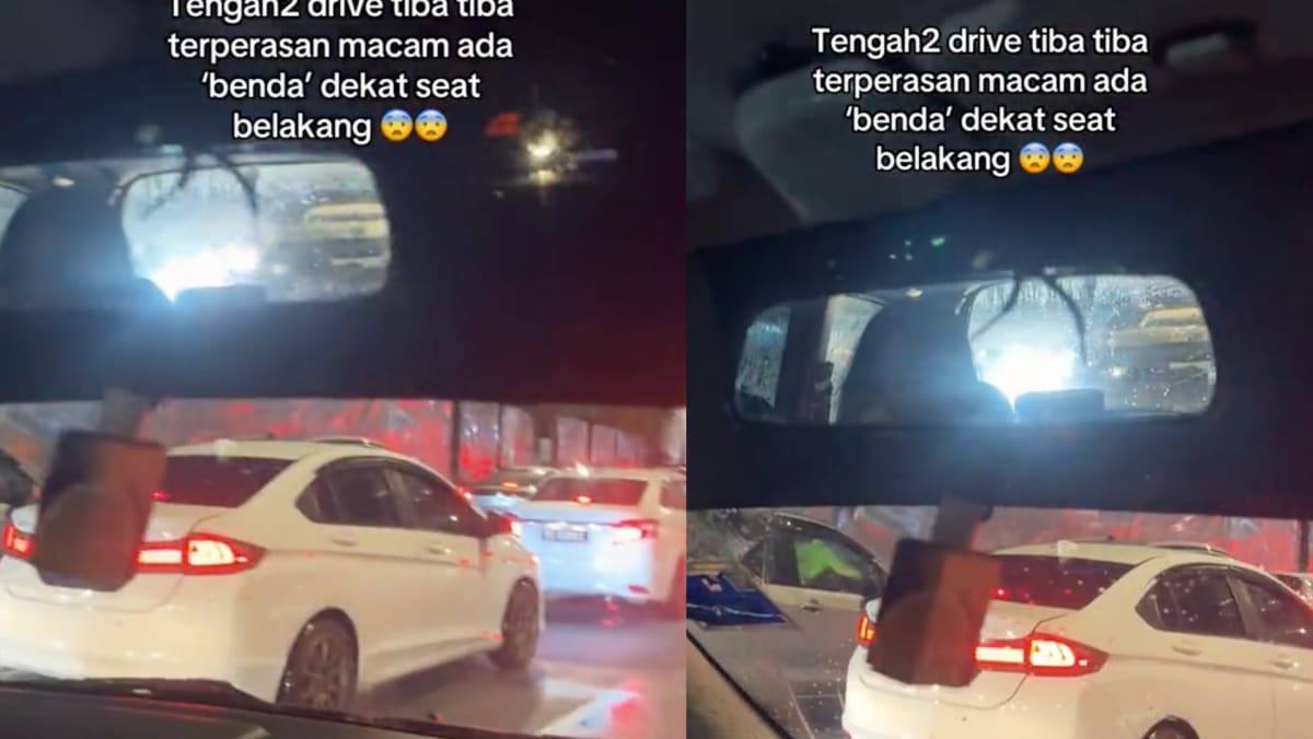 Woman Films Creepy Figure Sitting In Backseat Of Car While Driving Alone At Night