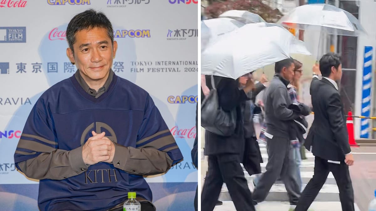 Tony Leung Gets Rained On Despite 5 People Holding Umbrellas For Him