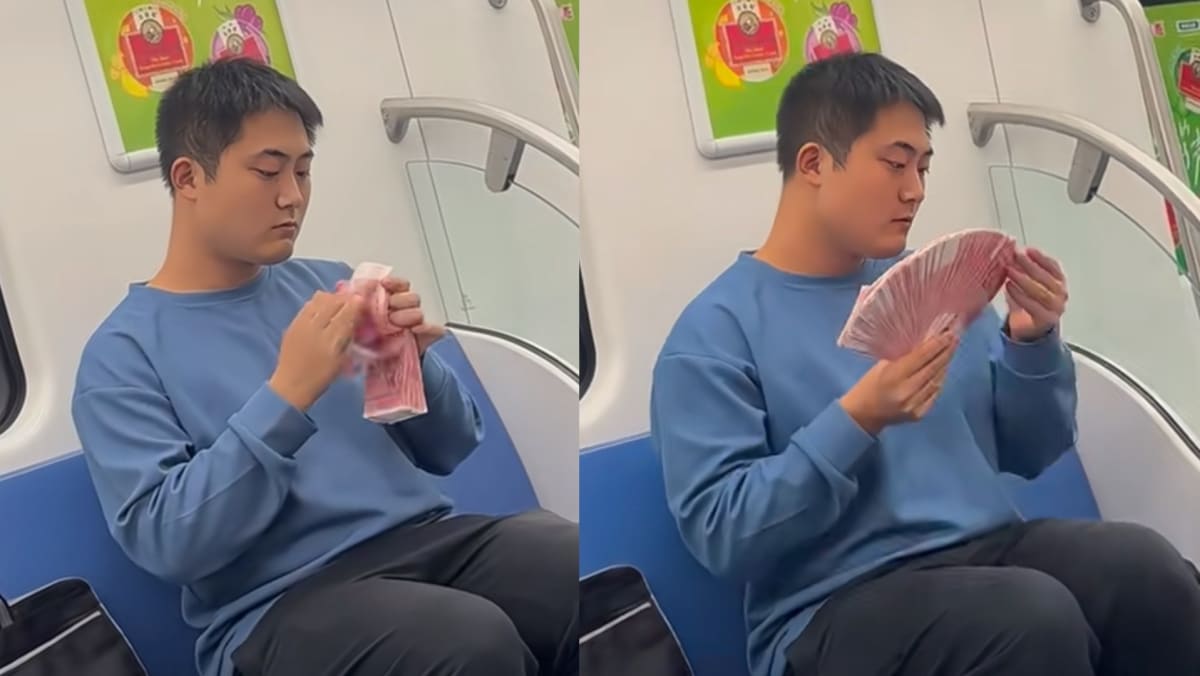 Man Spotted On Train Counting Cash Like A Bank Teller