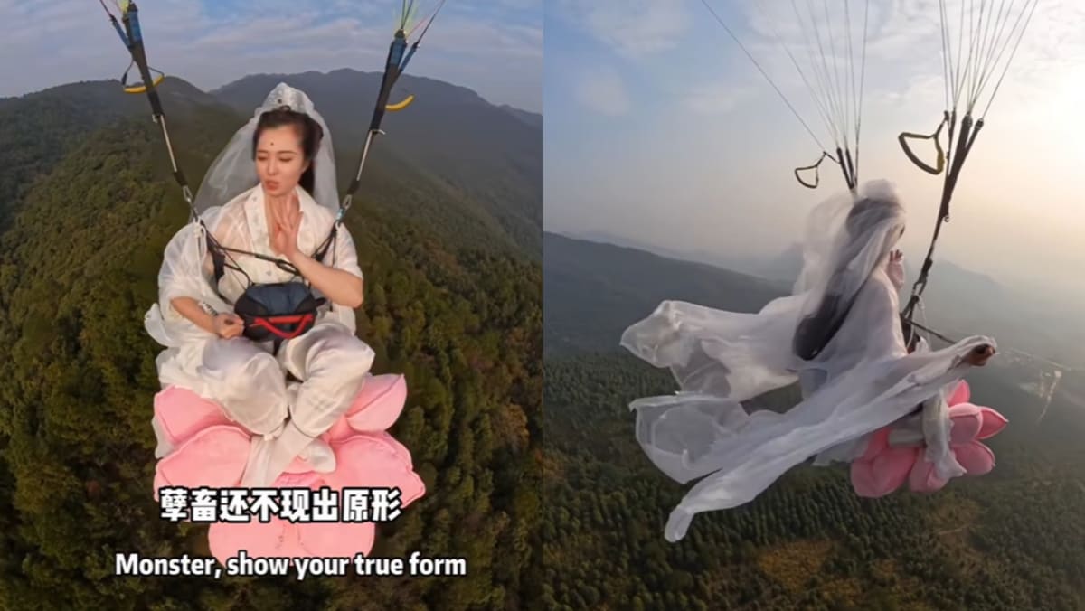 Paraglider Cosplays As Goddess of Mercy While In The Air